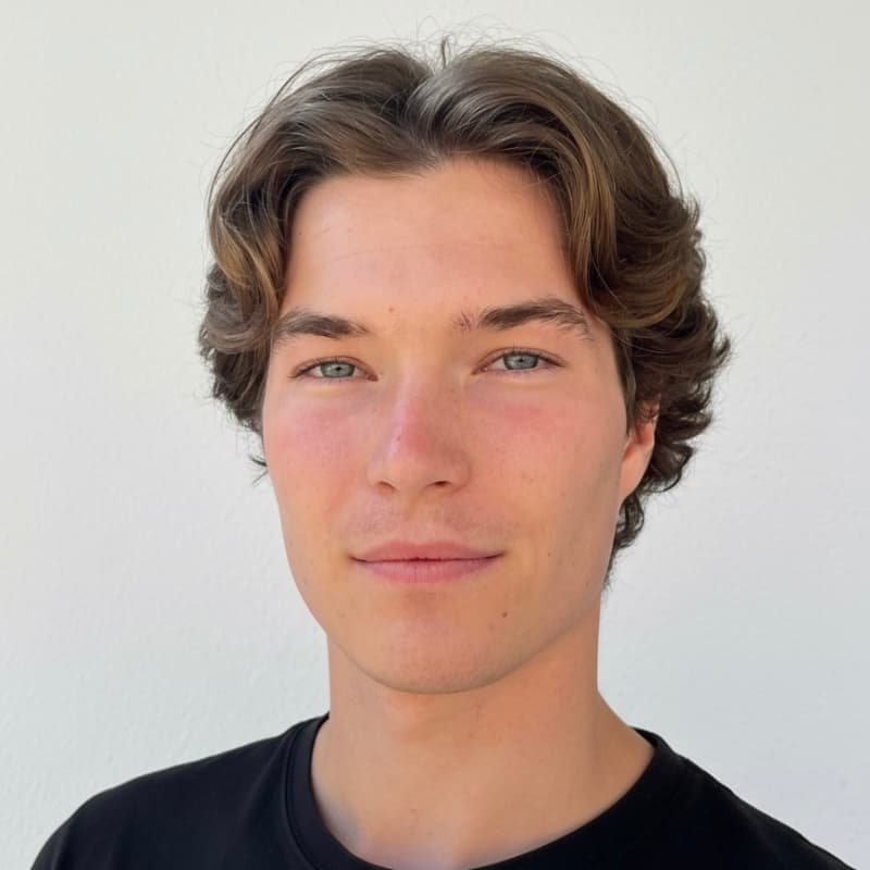 Gergő Iván, the person carrying the MacBook